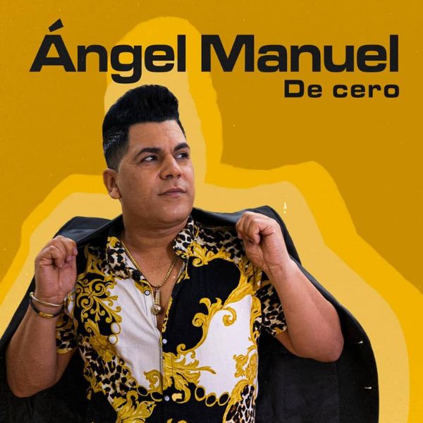 A concert crowd with hands in the air