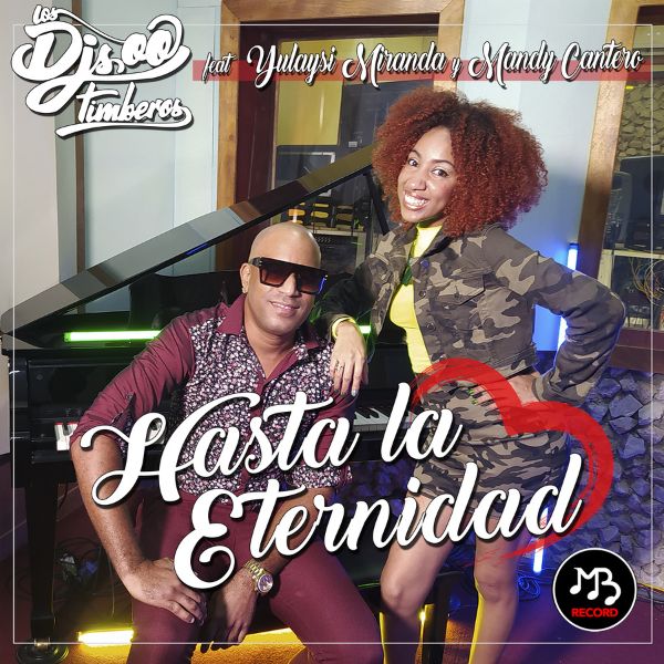 A concert crowd with hands in the air