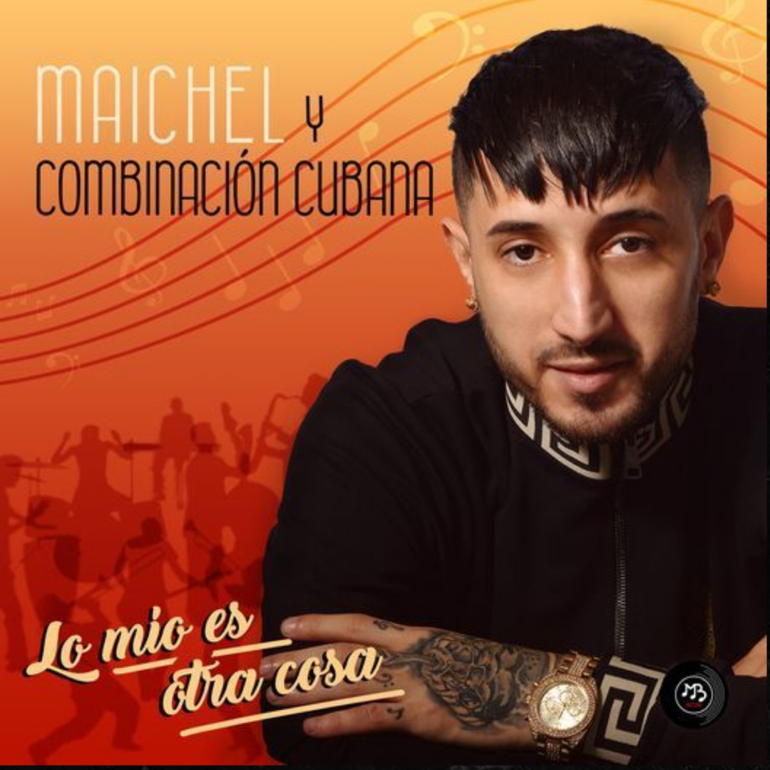 A concert crowd with hands in the air